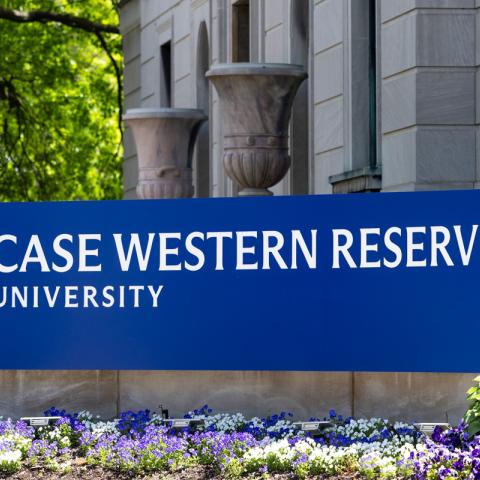 Bright blue sign reading "Case Western Reserve University"