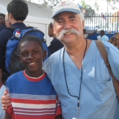 Young man standing next to Dr. Siegel