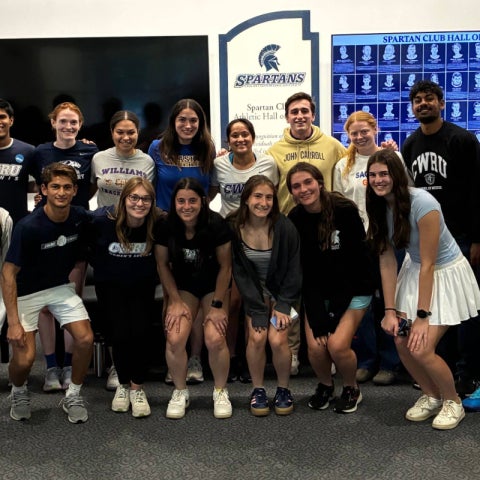 23 students in CWRU AIM posing and smiling together