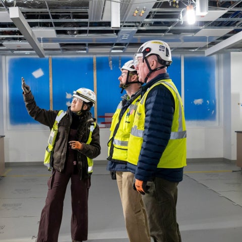 Abigail Mondragon, Philip Polito and Jack Kellogg at the construction site of the Interdisciplinary Science and Engineering Building. Photography by Nancy Andrews.