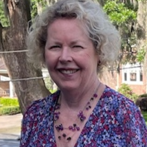 Linda Leatherbury standing outside on beautiful sunny day
