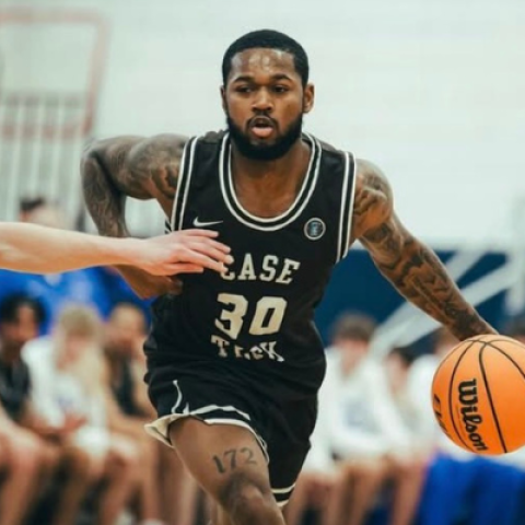 Ethan Edwards in action during a basketball game.
