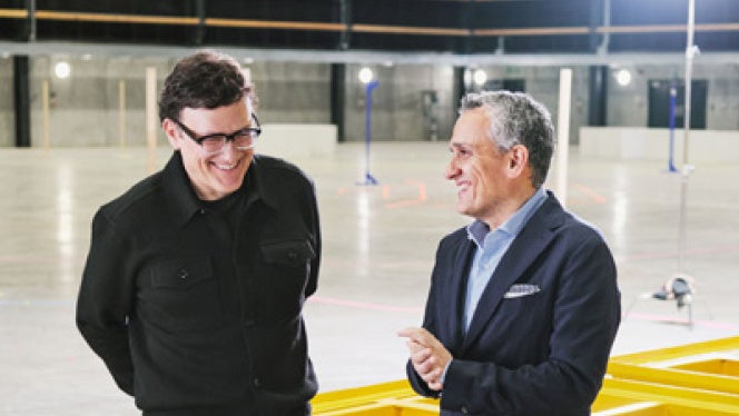 Two Russo brothers talking and smiling