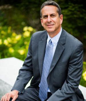 headshot of Case Western Reserve University assistant VP for media relations Bill Lubinger