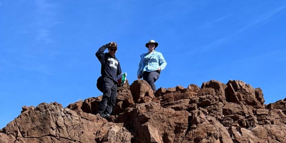 Patrica Carrig and Beverly Saylor on top of mountain in Death Valley