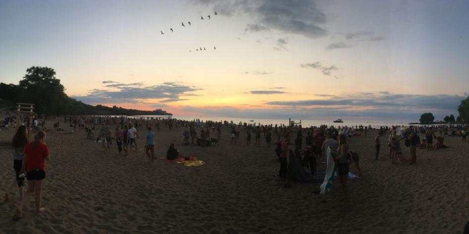 A lively beach day unfolds along Cleveland’s waterfront. Photo by Lex Ehrenschwender.