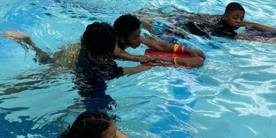 Kids swimming in pool