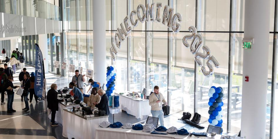 View of a registration table at Blue Bash event during Homecoming and Reunion Weekend 2025.