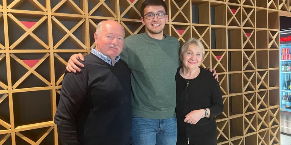 Connor Flores with a Slovakian couple during a day trip to Bratislava.