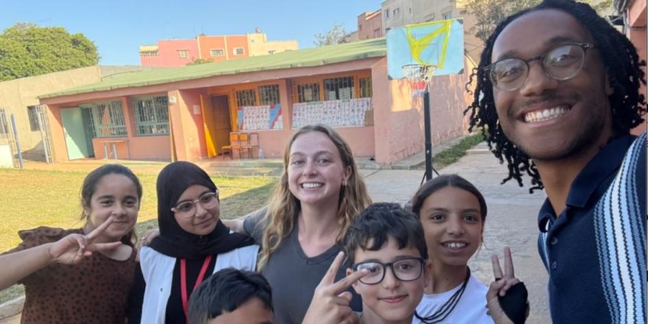 Anthony Wiles with peer and local children in Morocco.