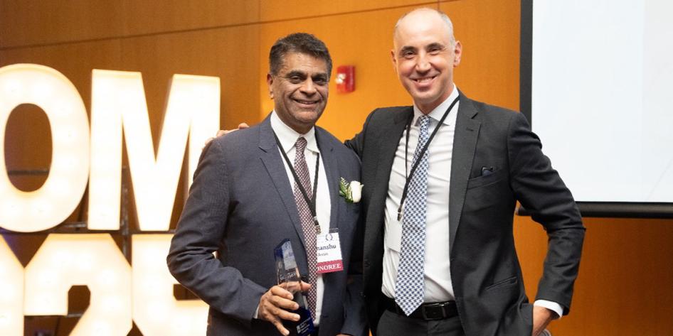 Himanshu Amin receiving his award from Dean Andrew Medvedev