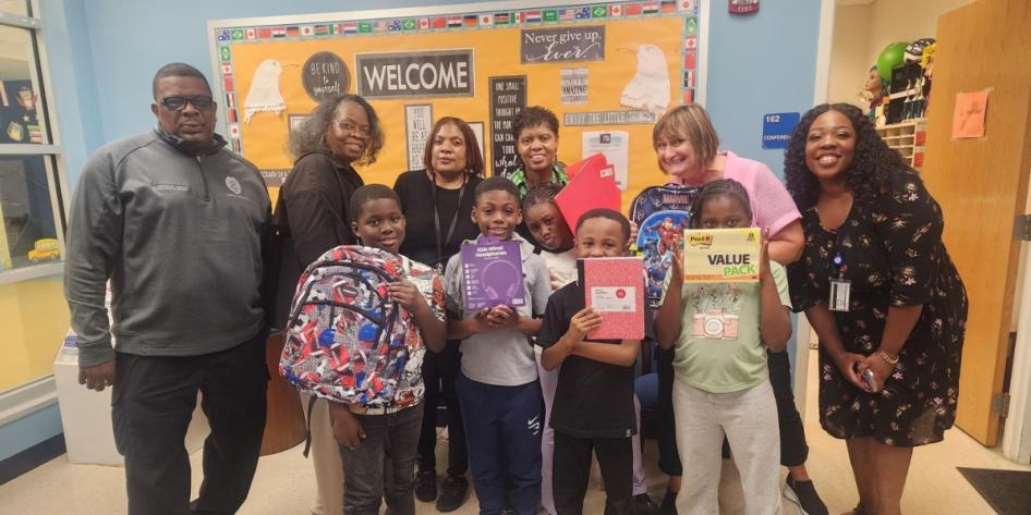 Staff members of Project STEP-UP partner with the CWRU Staff Advisory Council to donate supplies to students of Daniel E. Morgan School. 