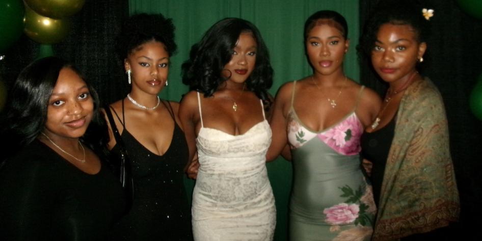 Juliet Atieno (pictured center) and colleagues attend CWRU's Ebony Ball. 