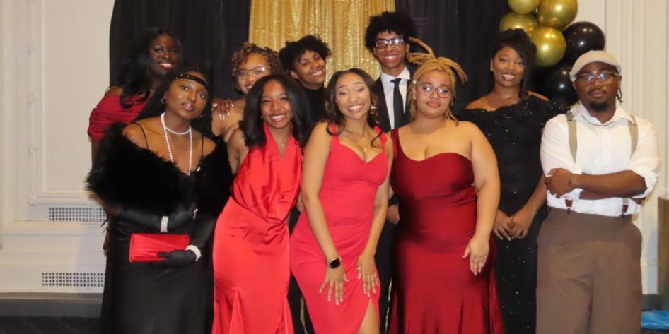 Joy Hendrix and members of the 2024-25 African American Society executive board attend CWRU's 51st annual Ebony Ball.  