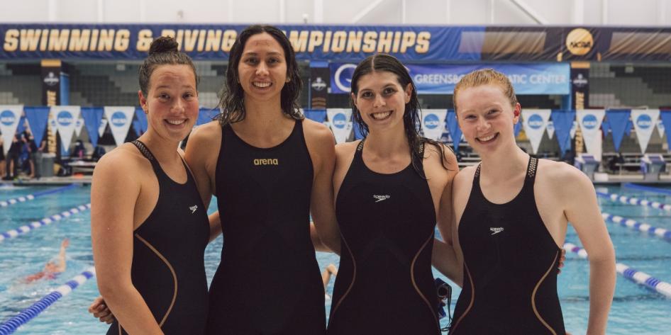 Claire Kozma poses with teammates at NCAA championship swim meet. 