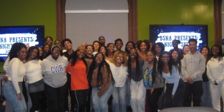 Lorenzo Lopes (pictured center) poses for a group photo with attendees of the Black Student Nursing Association's first event. 
