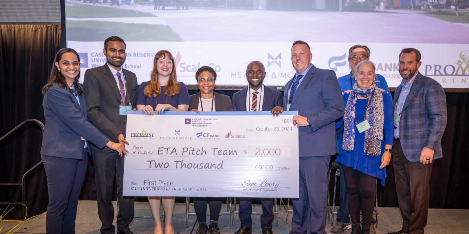Olatunde Akin-Oluyomi (pictured center) with the winning team of the Entrepreneurship Through Acquisition Fast Pitch Competition. 