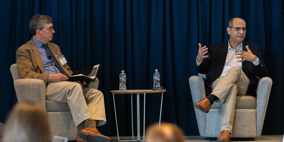 Image of Chris Zorman and Milind Bhanoo talking