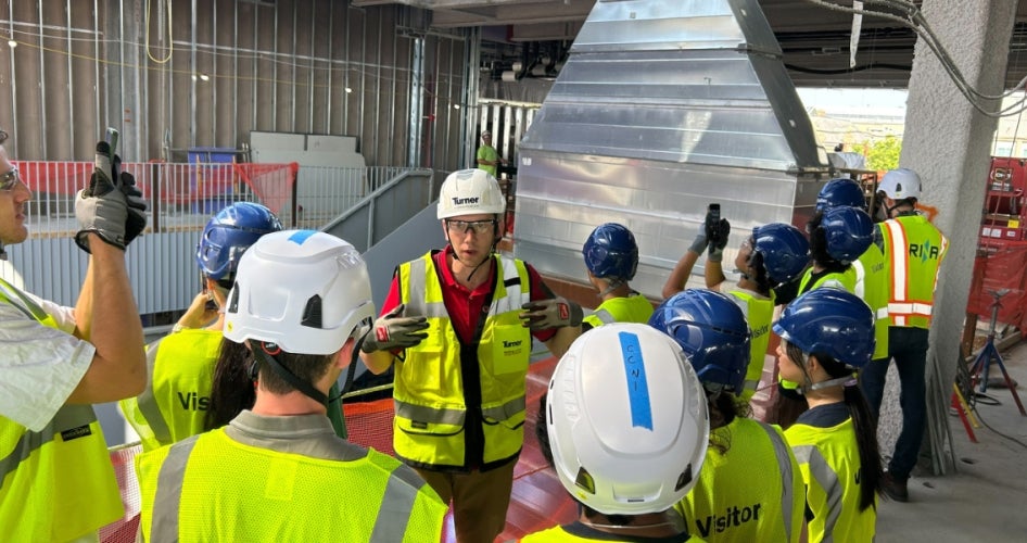Andrew Froelich gives a tour of the ISEB construction site to members of the American Society of Civil Engineers. 