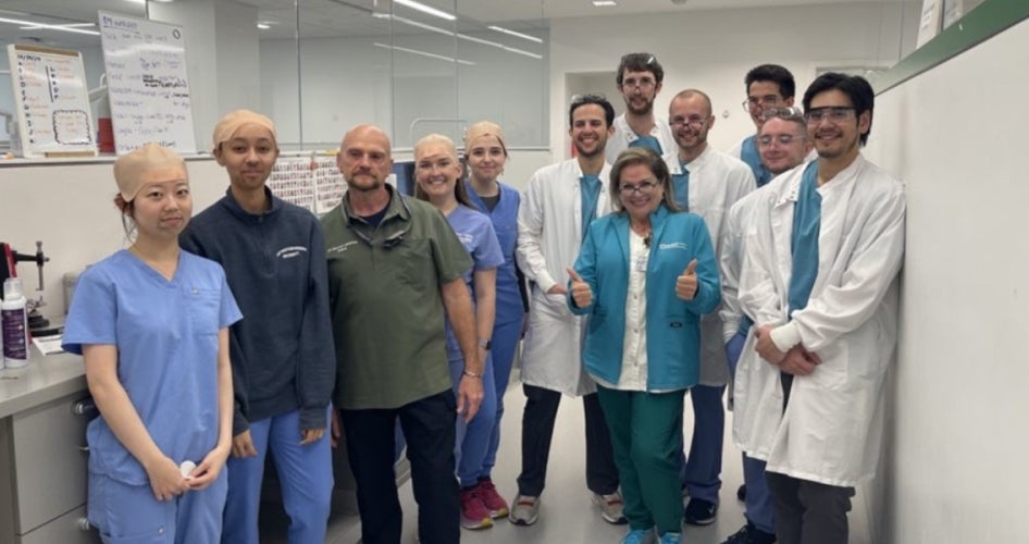 Lauren Tipping and her clinic group dress up as their dental school preceptors.