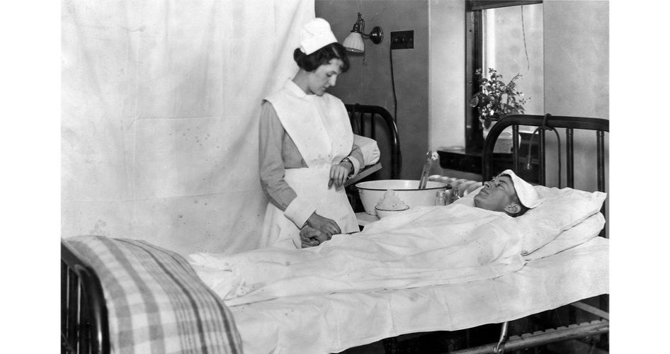 A vintage scene shows a nurse in a uniform tending to a patient in a hospital bed. The nurse checks the patient's wrist. The room is calm and softly lit.