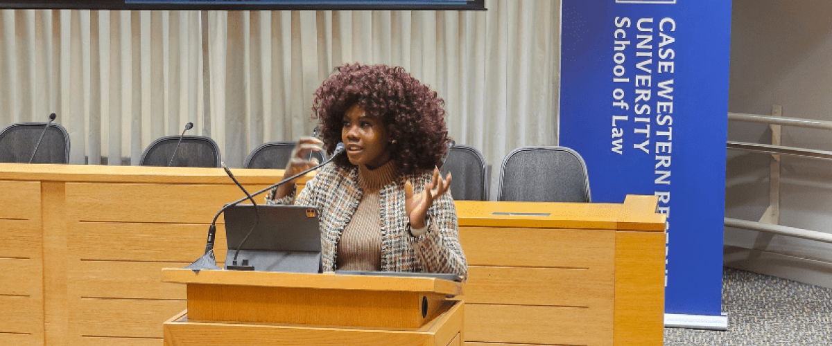 Conner standing in the Moot Courtroom during the presentation