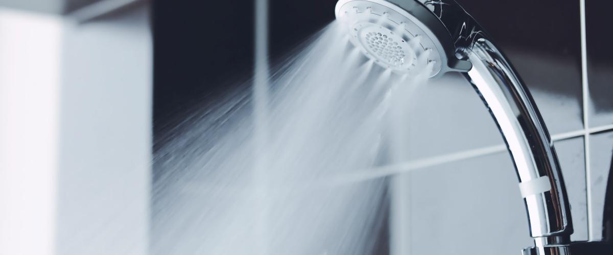 Photo of water spraying from a shower head