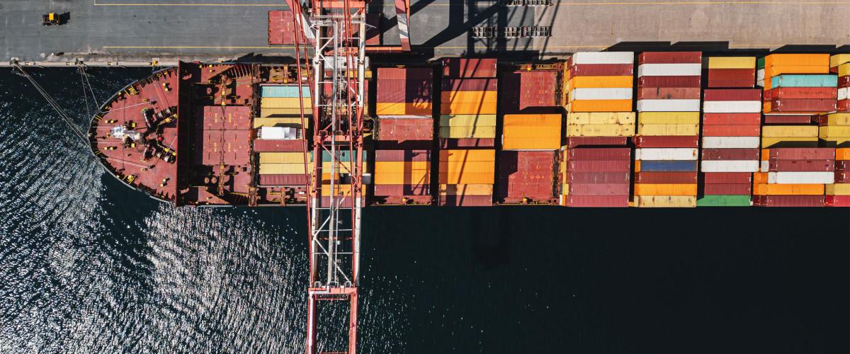 Overhead photo of a docked container ship