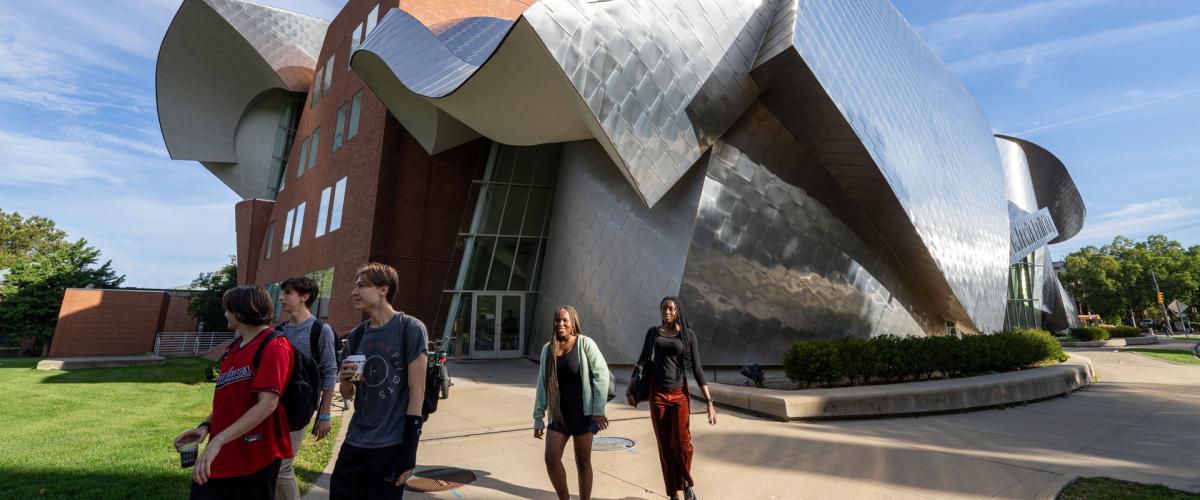 Photo of students walking in front of the Peter B. Lewis Building at CWRU