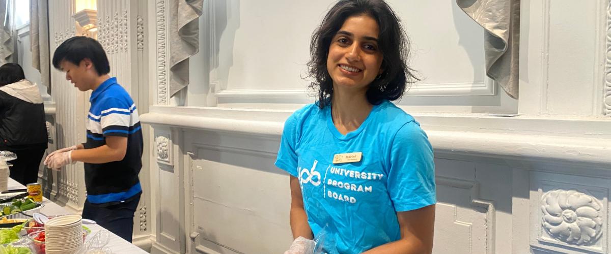 Harini Ganapathy assists at a volunteering event with the University Program Board. 
