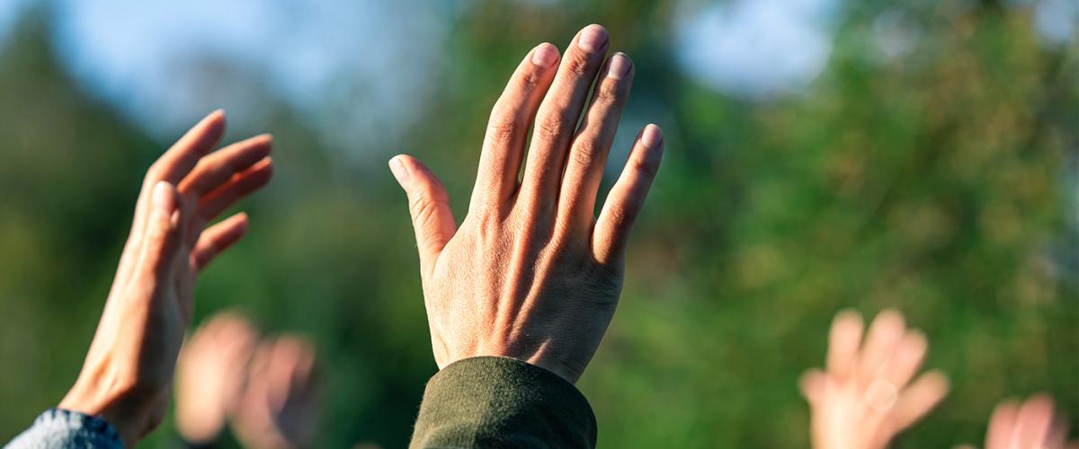 the hands of a religious group