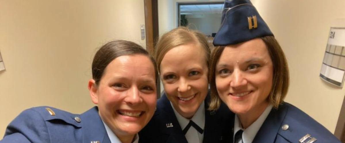 U.S. Air National Guard Captain Abby Henkel, RN, with fellow military service members