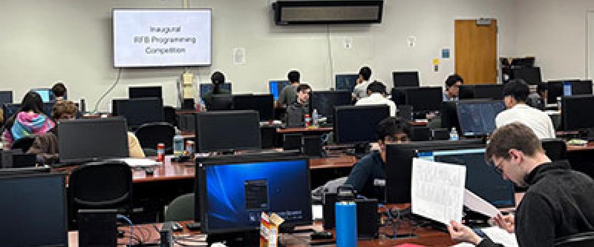 Students in a computer lab compete in the final round of the inaugural RFB Programming Competition