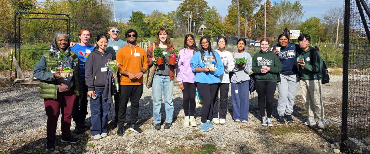 Photo of students volunteering at a local urban farm