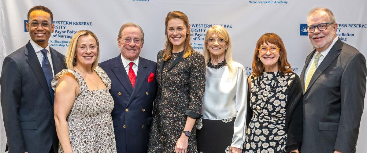 Case Western Reserve University donors, professors and administrators pose at an event for the nursing school