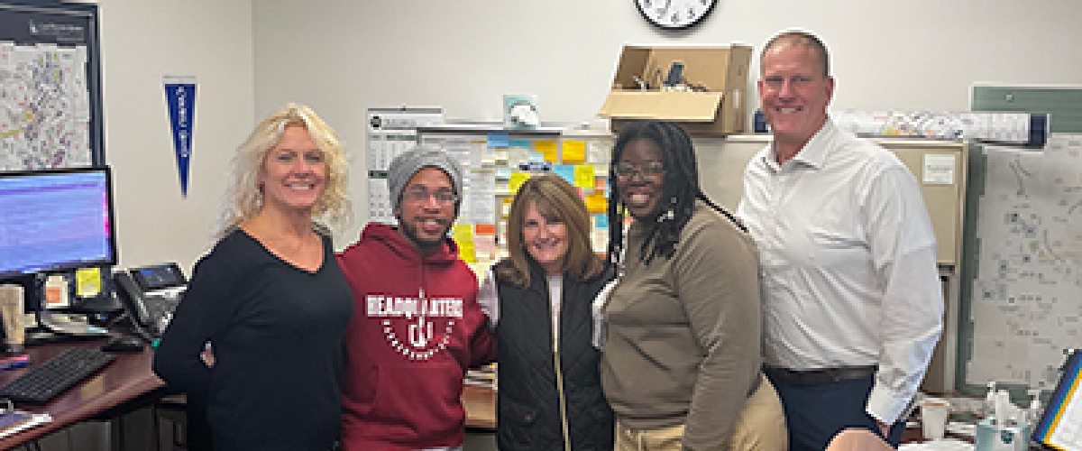 Bridget Flowers, Jermaine Brown, Diane Olshavsky, Kiara Lane and Dean Tufts pose for a group photo.