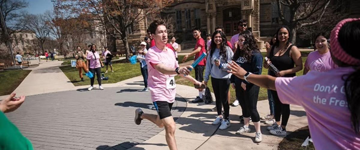 Students running in the Hudson Relays