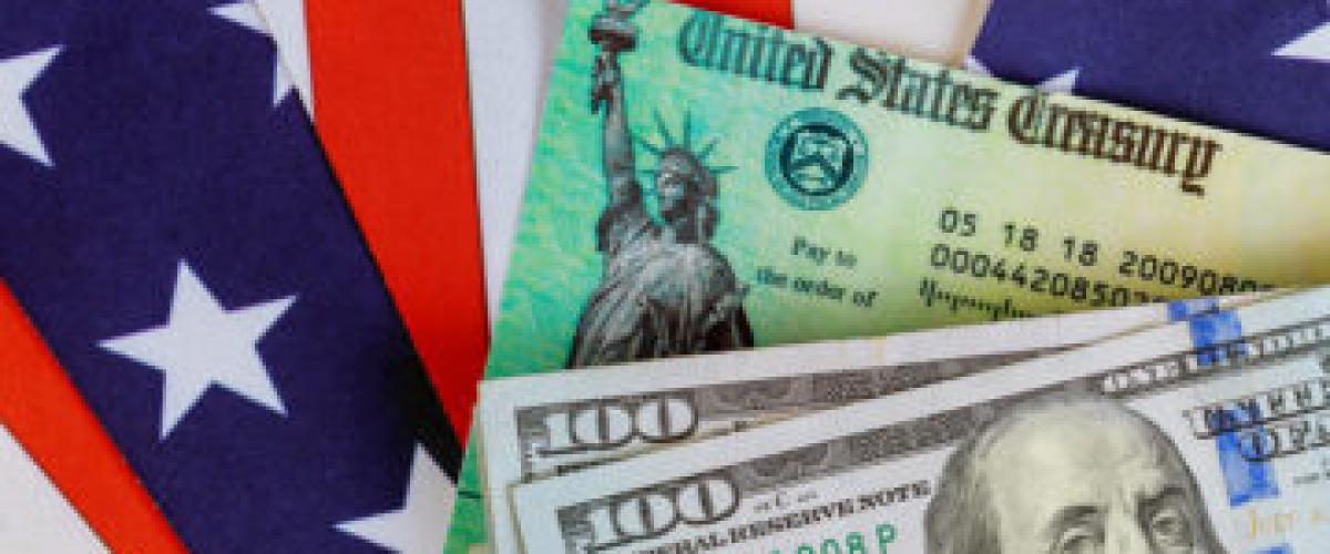 U.S. money with U.S. flag