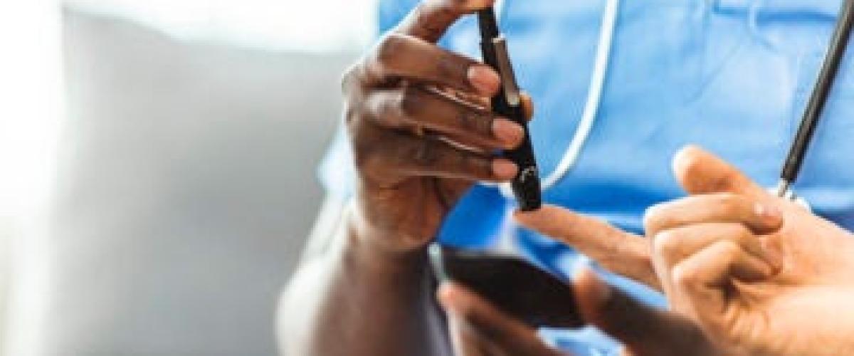 Blood sugar being tested with finger prick