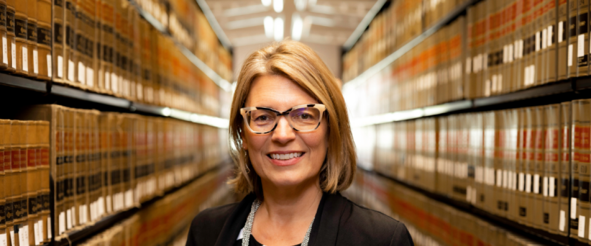 Jessie Hill photographed in a library