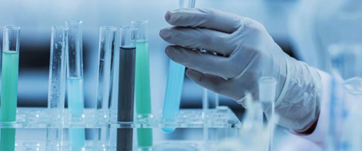 green%20blue%20test%20tubes%20hand.jpg