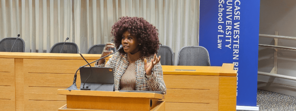 Conner standing in the Moot Courtroom during the presentation