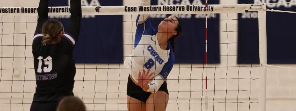 Kalli Wall playing volleyball.