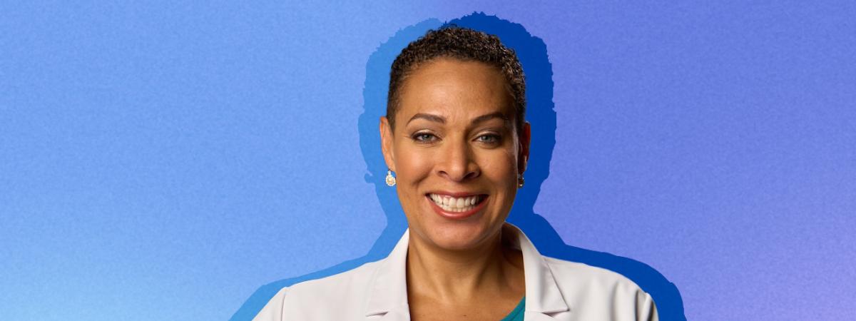 A photo of Dr. Elizabeth Clayborne in her white coat.