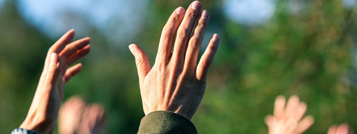 the hands of a religious group
