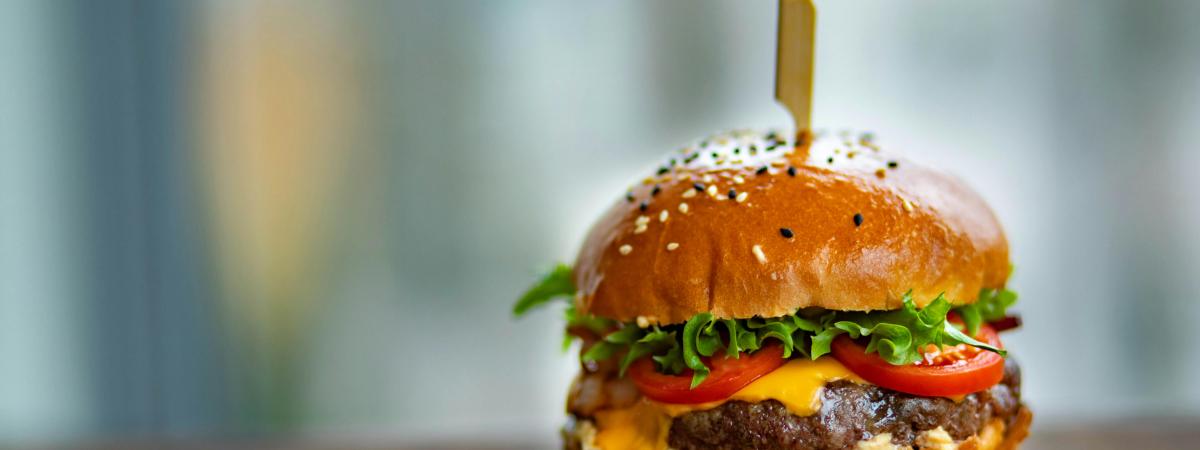 image of burger sitting on table