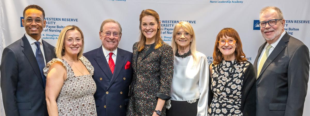 Case Western Reserve University donors, professors and administrators pose at an event for the nursing school