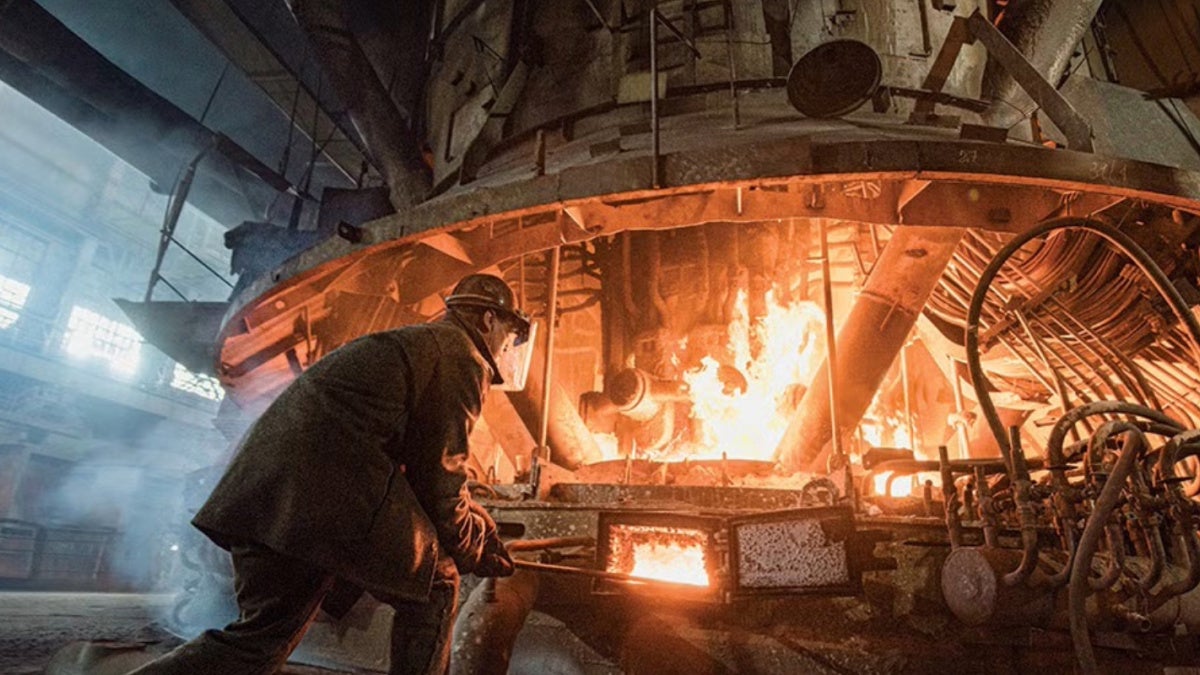 Man processing steel.
