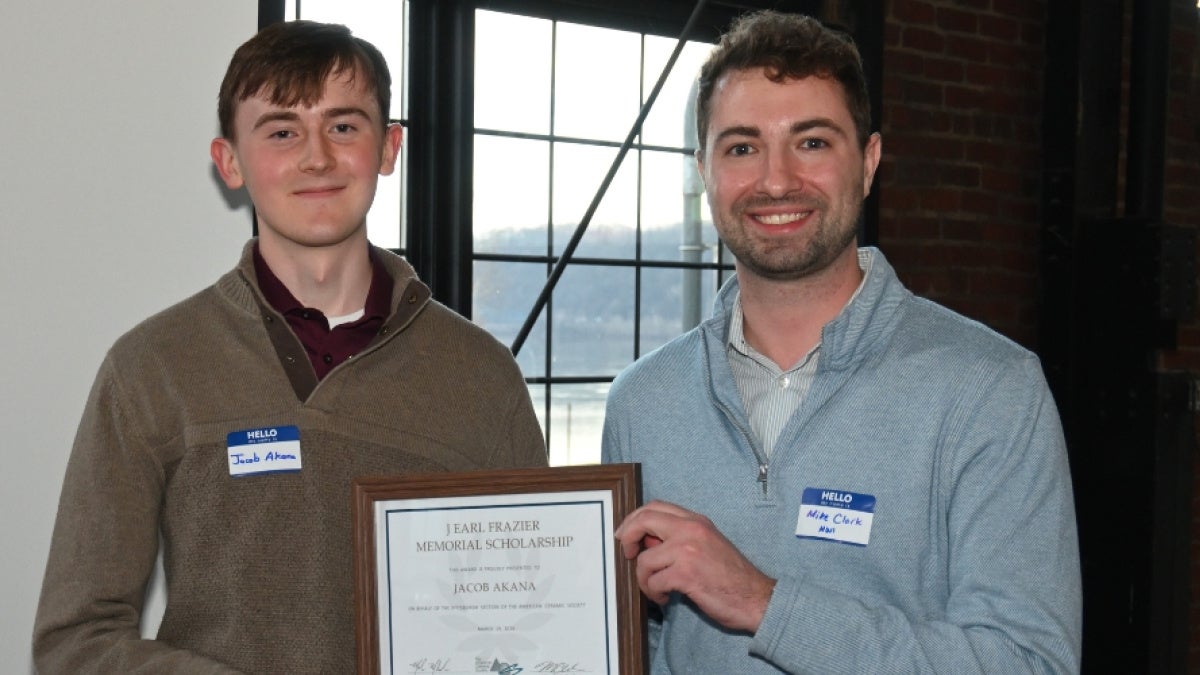 Jacob Akana (pictured left) receives the J. Earl Frazier Memorial Scholarship. 