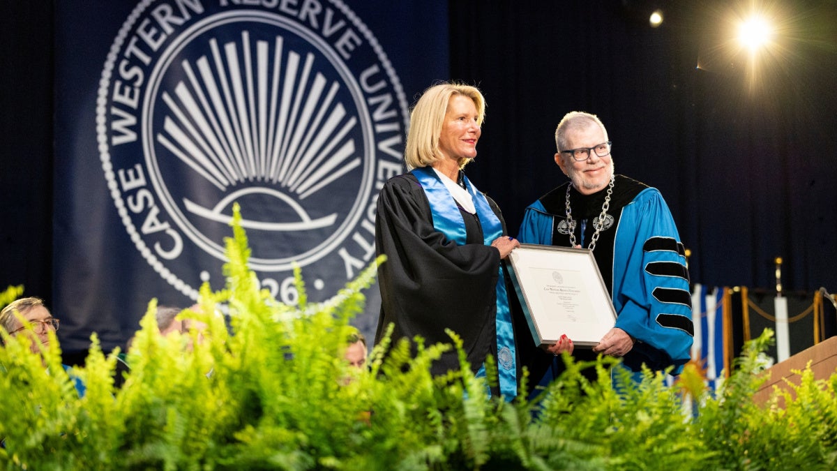 Ellen Mavec (pictured left) receives CWRU's President's Award for Visionary Achievement from President Eric W. Kaler.